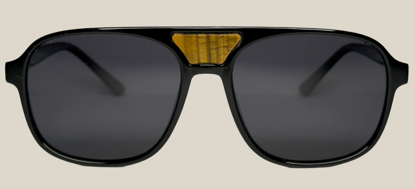 The "Karma" frames are nested with unique natural crystals. Black frames with Polarized sunglass lenses. Size: 54-16-145