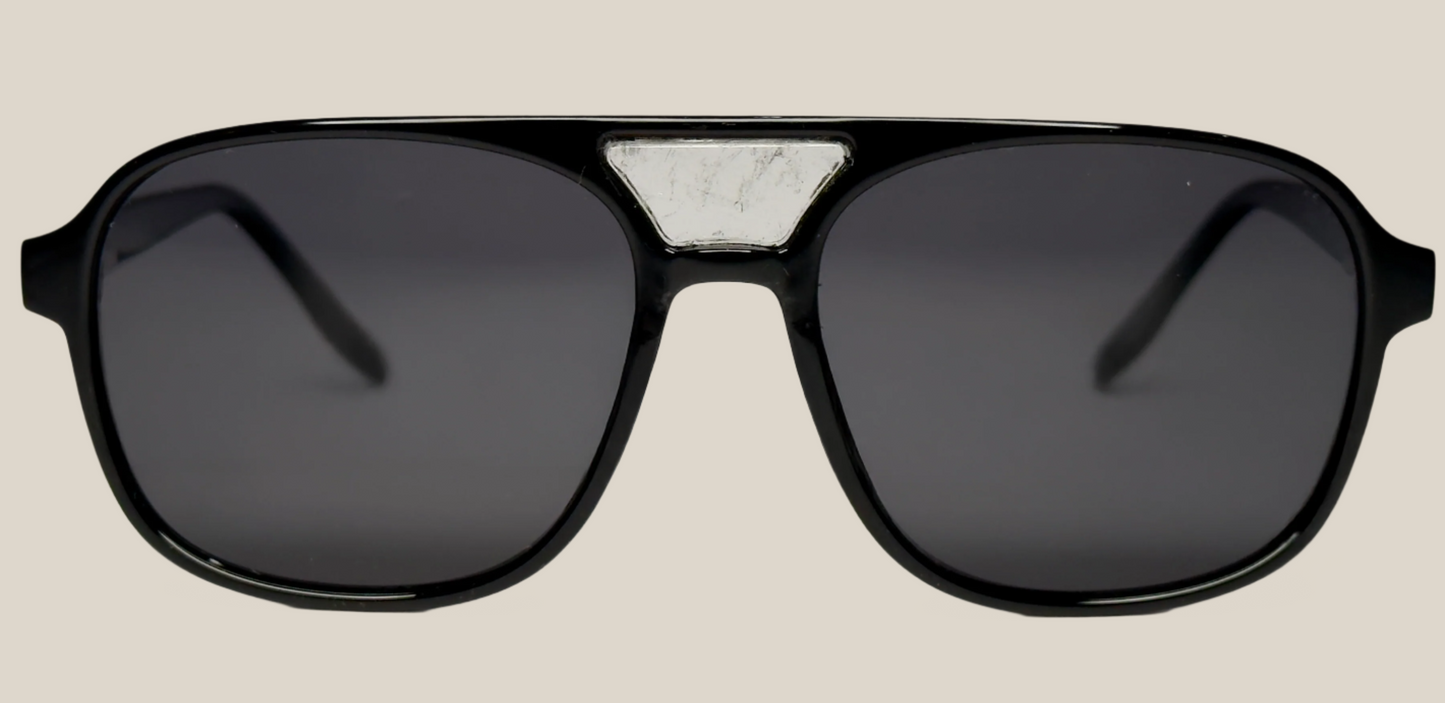 The "Karma" frames are nested with unique natural crystals. Black frames with Polarized sunglass lenses. Size: 54-16-145
