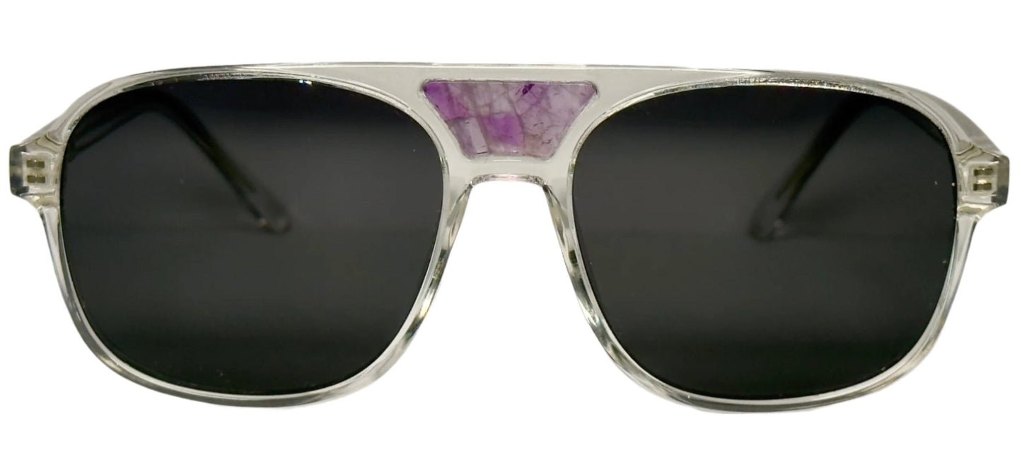 The "Karma" frames are nested with unique natural crystals. Clear frames with Polarized sunglass lenses. Size: 54-16-145